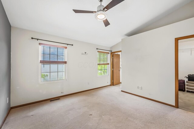 861 Summerville Dr, Delaware, OH 43015 - empty room featuring carpet, ceiling fan, and lofted ceiling