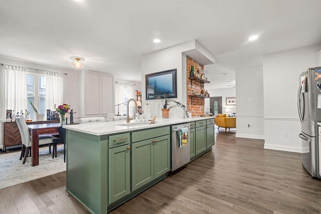 112 Oak Hill Ave, Delaware, OH 43015 - kitchen with green cabinets, appliances with stainless steel finishes, dark wood-type flooring, light countertops, and healthy amount of natural light