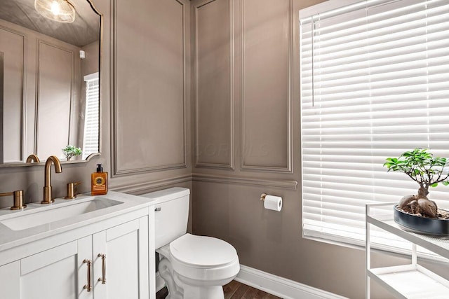 112 Oak Hill Ave, Delaware, OH 43015 - half bathroom with vanity and wood finished floors