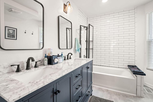 112 Oak Hill Ave, Delaware, OH 43015 - full bath featuring double vanity, plenty of natural light, and bathing tub / shower combination