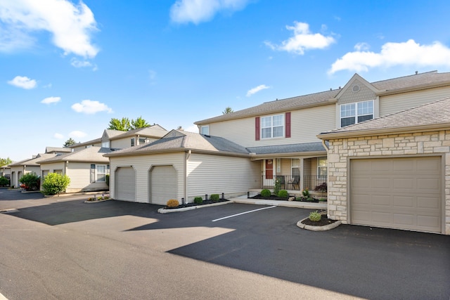 1814 Bennigan Dr Unit 88B, Hilliard, OH 43026 - view of property featuring a porch and a residential view