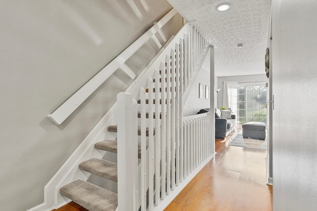 1814 Bennigan Dr Unit 88B, Hilliard, OH 43026 - stairway with wood finished floors