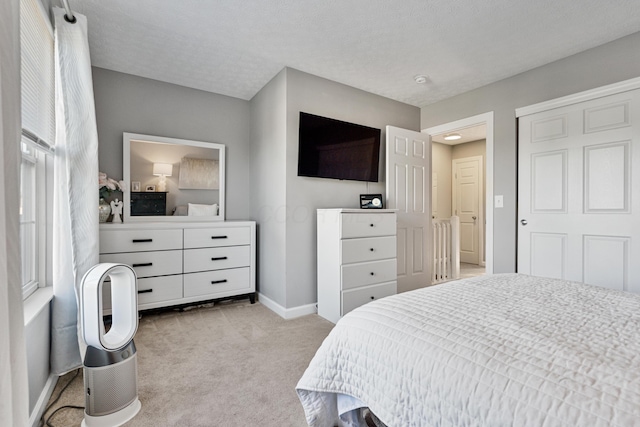 1814 Bennigan Dr Unit 88B, Hilliard, OH 43026 - bedroom featuring light colored carpet and baseboards
