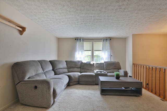 7805 Kiowa Way, Columbus, OH 43085 - living area featuring carpet floors and a textured ceiling
