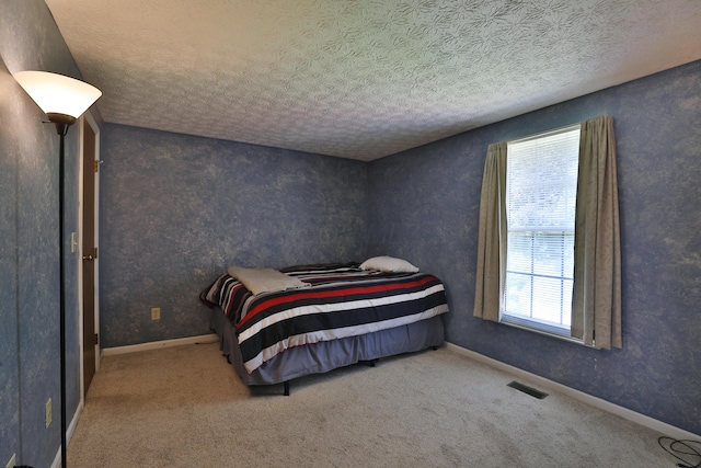 7805 Kiowa Way, Columbus, OH 43085 - carpeted bedroom with a textured ceiling and baseboards