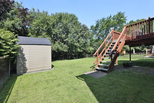 7805 Kiowa Way, Columbus, OH 43085 - fenced backyard featuring a shed, a wooden deck, stairs, and view of scattered trees
