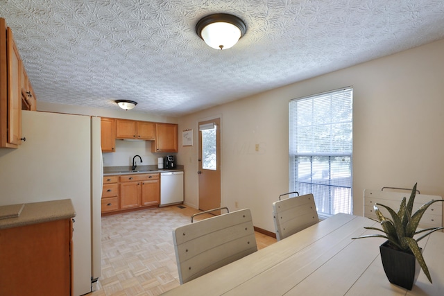 7805 Kiowa Way, Columbus, OH 43085 - kitchen featuring white appliances and light countertops