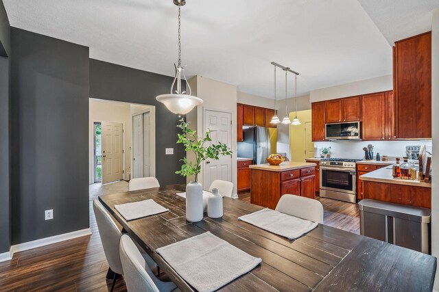 142 Blakemore Dr, Delaware, OH 43015 - dining area featuring dark wood finished floors