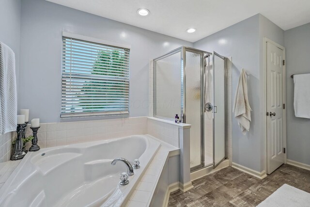 142 Blakemore Dr, Delaware, OH 43015 - full bathroom featuring a stall shower and a garden tub