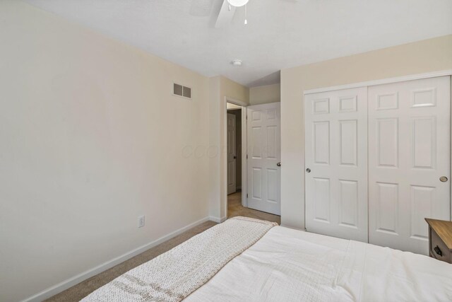 142 Blakemore Dr, Delaware, OH 43015 - bedroom with carpet, a closet, and a ceiling fan