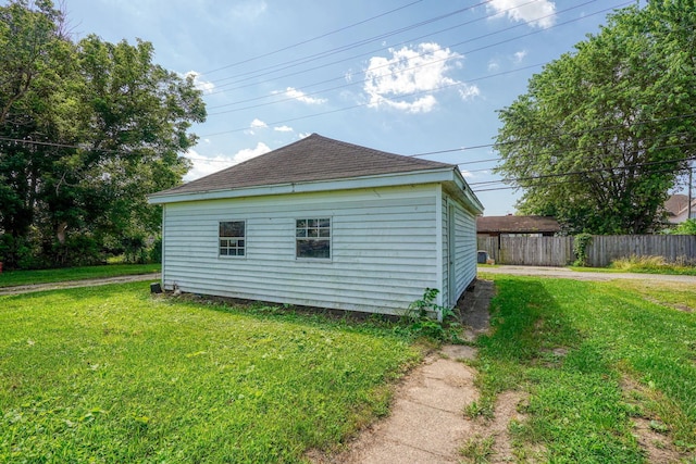 570 E Water St, Chillicothe, OH 45601 - view of side of property featuring roof with shingles