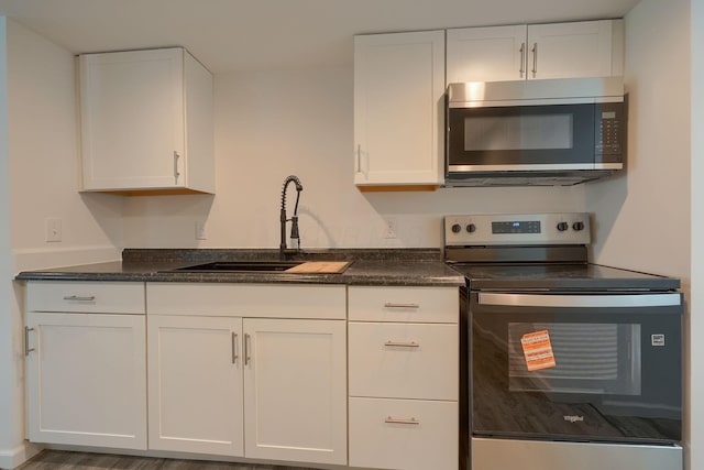 570 E Water St, Chillicothe, OH 45601 - kitchen featuring appliances with stainless steel finishes and white cabinetry
