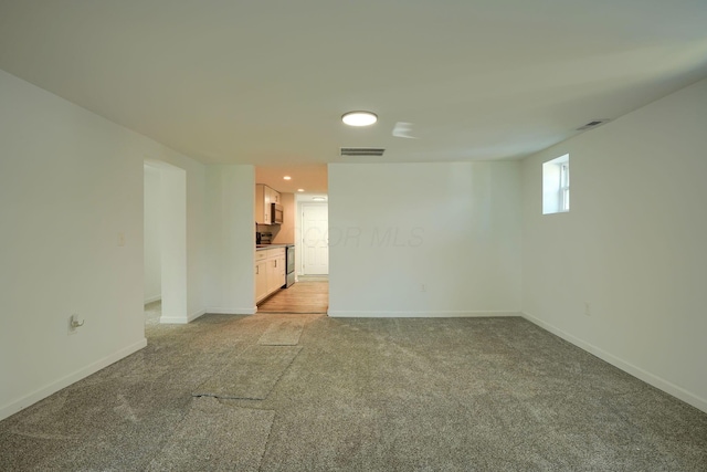 570 E Water St, Chillicothe, OH 45601 - unfurnished room featuring light colored carpet and recessed lighting