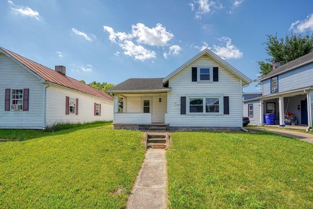 570 E Water St, Chillicothe, OH 45601 - view of front of property with a front lawn and a metal roof