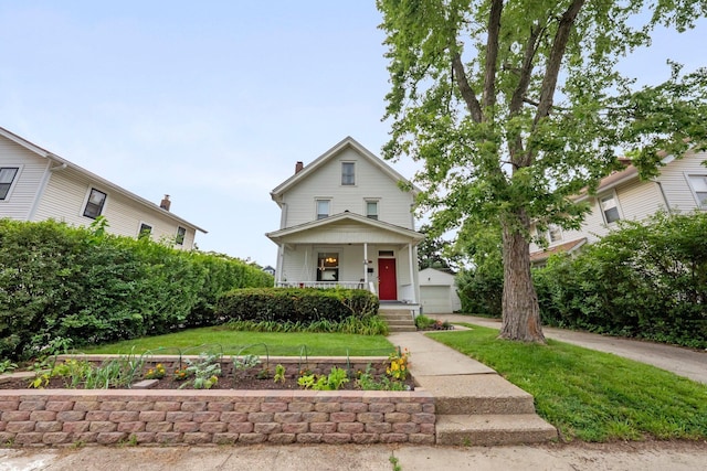 116 W Longview Ave, Columbus, OH 43202 - view of front of home with covered porch and a front yard