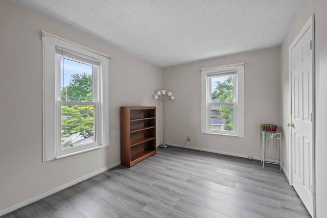 116 W Longview Ave, Columbus, OH 43202 - unfurnished bedroom featuring light wood-style floors and baseboards