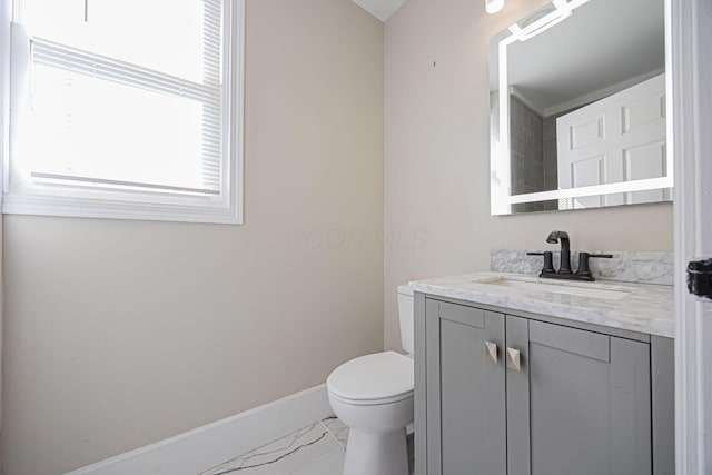 765 Campbell Ave, Columbus, OH 43222 - bathroom with vanity and marble look tile flooring