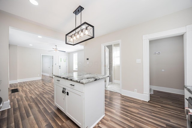 765 Campbell Ave, Columbus, OH 43222 - kitchen featuring a ceiling fan, dark wood finished floors, white cabinets, hanging light fixtures, and recessed lighting