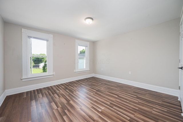 765 Campbell Ave, Columbus, OH 43222 - empty room featuring wood finished floors and baseboards