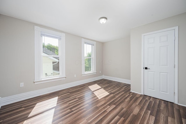 765 Campbell Ave, Columbus, OH 43222 - spare room with dark wood finished floors and baseboards