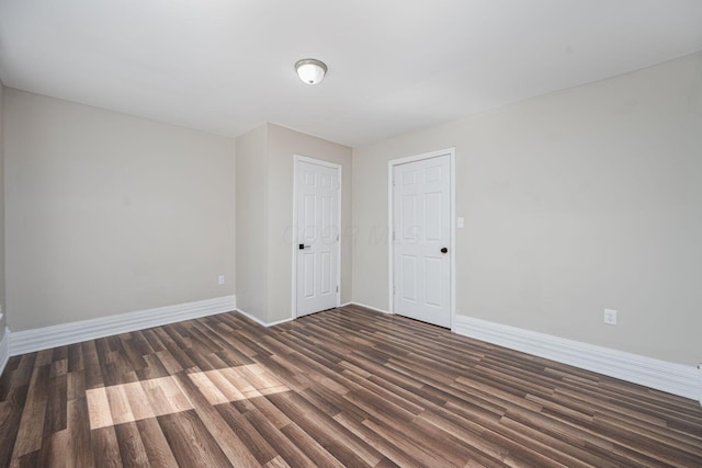 765 Campbell Ave, Columbus, OH 43222 - empty room with wood finished floors and baseboards
