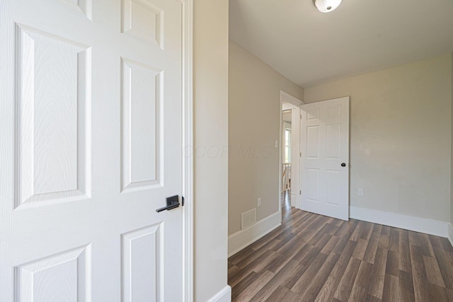 765 Campbell Ave, Columbus, OH 43222 - unfurnished bedroom featuring dark wood finished floors and baseboards
