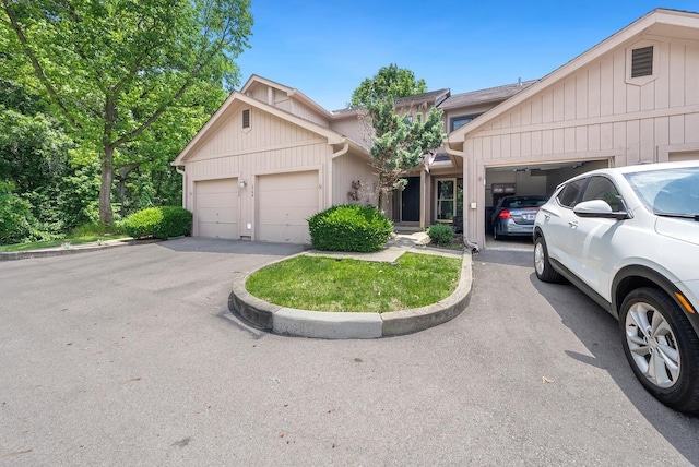 1768 Lake Meadow Dr Unit 1768H, Reynoldsburg, OH 43068 - view of property featuring a garage and asphalt driveway