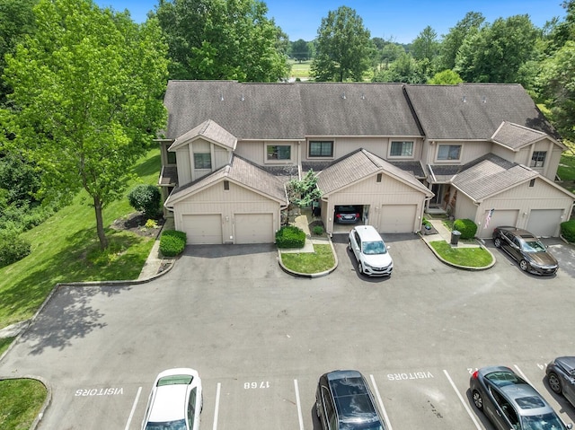1768 Lake Meadow Dr Unit 1768H, Reynoldsburg, OH 43068 - multi unit property featuring a shingled roof and view of wooded area