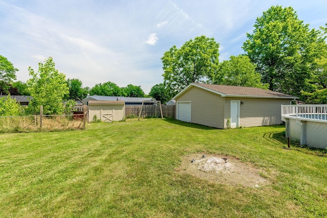1282 Lawndale Rd, Marion, OH 43302 - view of yard featuring a garage, a shed, and an outdoor pool