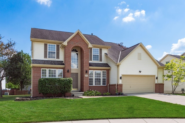 5899 Cove Point Ct, Columbus, OH 43228 - traditional-style house featuring driveway, brick siding, an attached garage, and a shingled roof