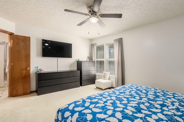 5899 Cove Point Ct, Columbus, OH 43228 - bedroom featuring carpet floors, a textured ceiling, and a ceiling fan