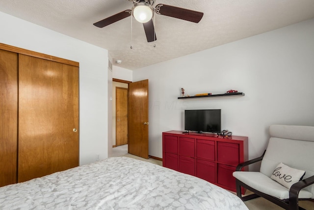 5899 Cove Point Ct, Columbus, OH 43228 - carpeted bedroom with a closet and ceiling fan