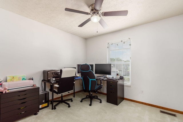 5899 Cove Point Ct, Columbus, OH 43228 - home office with ceiling fan, carpet flooring, and a textured ceiling