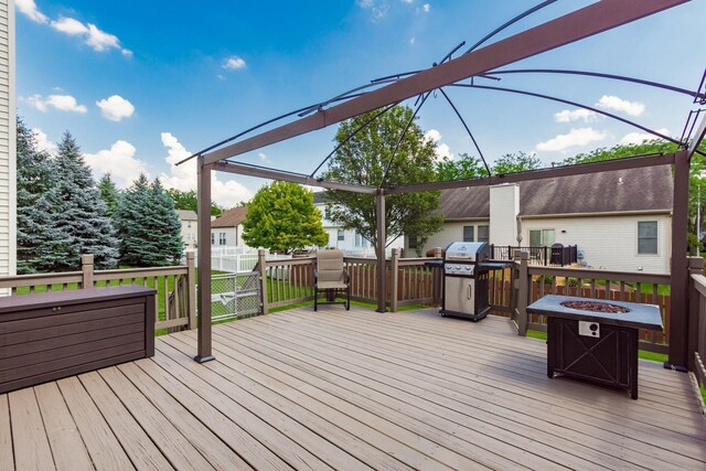 5899 Cove Point Ct, Columbus, OH 43228 - wooden terrace with an outdoor fire pit and area for grilling