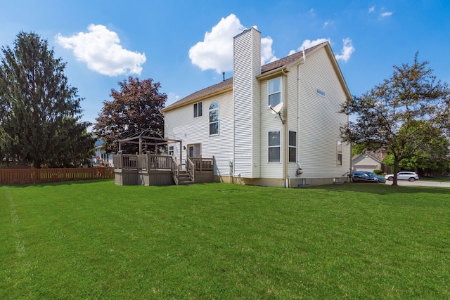 5899 Cove Point Ct, Columbus, OH 43228 - rear view of house featuring a gazebo, a chimney, and a deck
