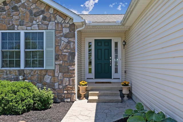3582 Panhandle Rd, Delaware, OH 43015 - doorway to property featuring stone siding and a shingled roof