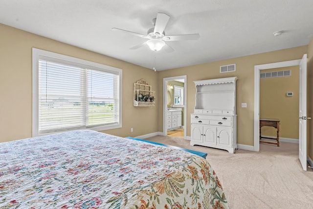 3582 Panhandle Rd, Delaware, OH 43015 - bedroom featuring light colored carpet, a ceiling fan, and ensuite bath