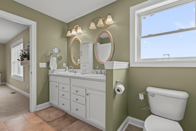 3582 Panhandle Rd, Delaware, OH 43015 - bathroom with double vanity and toilet