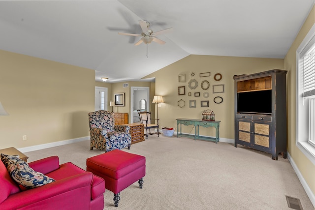 3582 Panhandle Rd, Delaware, OH 43015 - living room featuring ceiling fan, carpet floors, lofted ceiling, and plenty of natural light