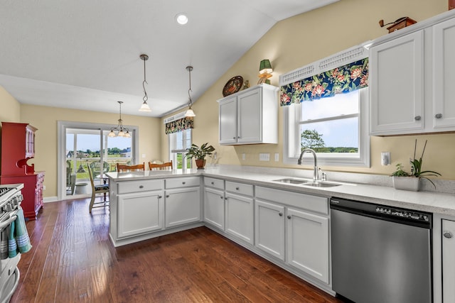 3582 Panhandle Rd, Delaware, OH 43015 - kitchen with stainless steel appliances, a peninsula, light countertops, dark wood finished floors, and white cabinets