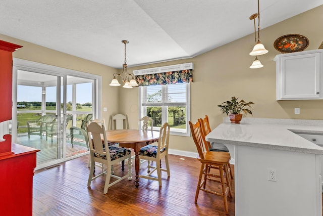3582 Panhandle Rd, Delaware, OH 43015 - dining room featuring a chandelier and dark wood-style floors