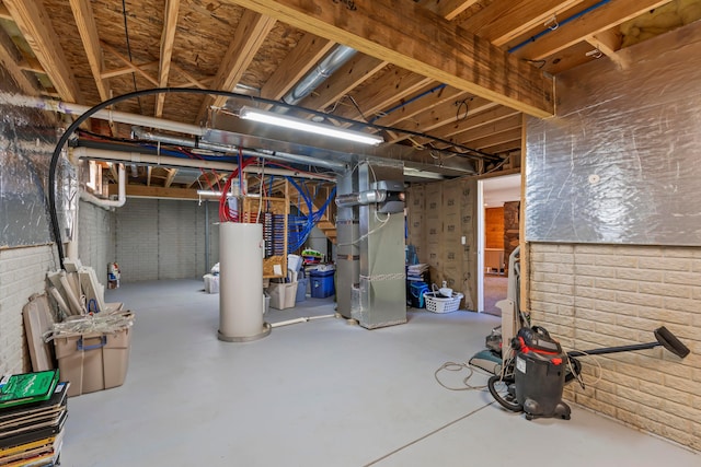 3582 Panhandle Rd, Delaware, OH 43015 - unfinished below grade area with water heater and brick wall