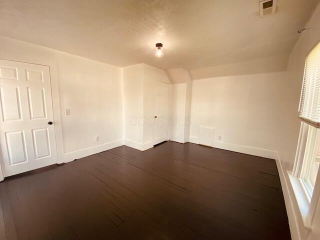 121 Maple St, London, OH 43140 - additional living space with dark wood finished floors and plenty of natural light