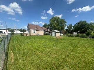 121 Maple St, London, OH 43140 - view of yard featuring a storage unit