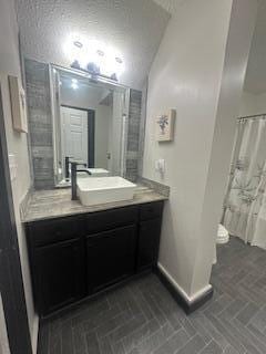 121 Maple St, London, OH 43140 - bathroom featuring vanity and brick patterned floors