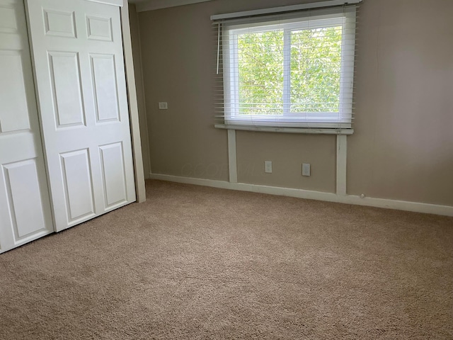 8565 Smith Calhoun Rd Unit 163, Plain City, OH 43064 - unfurnished bedroom with carpet flooring and baseboards
