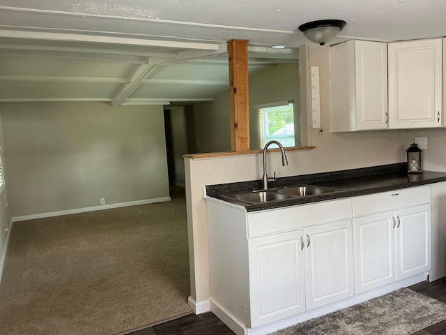 8565 Smith Calhoun Rd Unit 163, Plain City, OH 43064 - kitchen featuring white cabinetry and dark countertops