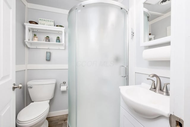 14060 Seminole Path, Lakeview, OH 43331 - full bathroom with a shower stall, wood finished floors, and vanity