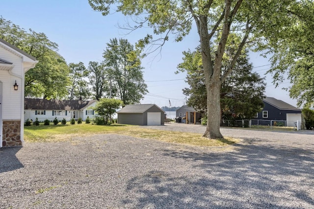 14060 Seminole Path, Lakeview, OH 43331 - view of yard with a garage and an outbuilding