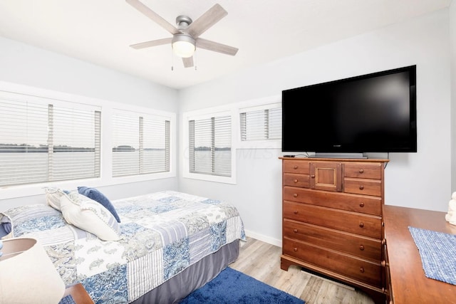 14060 Seminole Path, Lakeview, OH 43331 - bedroom with wood finished floors and a ceiling fan